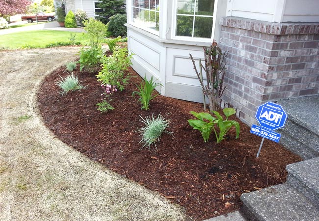 Mulching services by Green Thumb Company